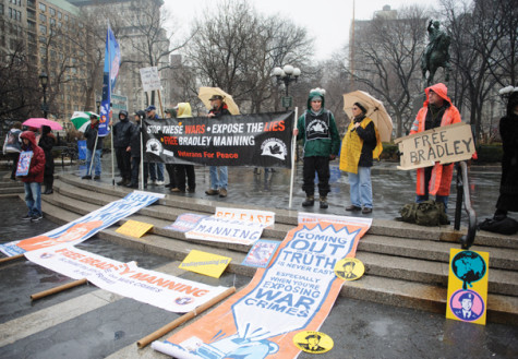 Protestors brave rain for prisoner Bradley Manning