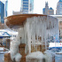 In Bryant Park a fountain freezes over in the cold of winter.