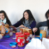 Sarah Vaz, Sohanna Islam and Shela Wu, left to right, make peanut butter and jelly sandwiches for Bowery Mission in Kimmel on Monday.