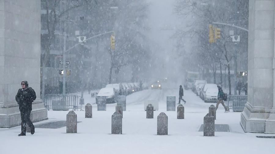 Washington Square Park and 5th Avenue in the snow. New York expects to see heavy snow showers Wednesday night.