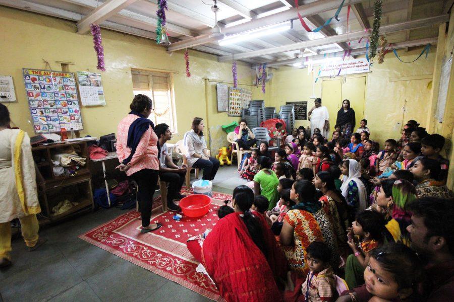 CAS+senior+Darshan+Mahabare+teaches+a+classroom+of+children%2C+mothers%2C+teachers+and+social+workers+in+Mumbai+how+to+wash+their+hands.+Mahabare%2C+alongside+Kanyon+Iwami%2C+is+a+representative+of+KickToChange%2C+an+organization+that+raises+funds+by+teaching+soccer+in+order+to+provide+hygiene+kits+for+communities+that+need+it.+