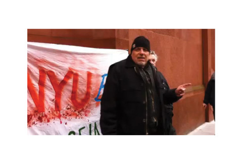 John Penley protests to convince NYU students to help homeless