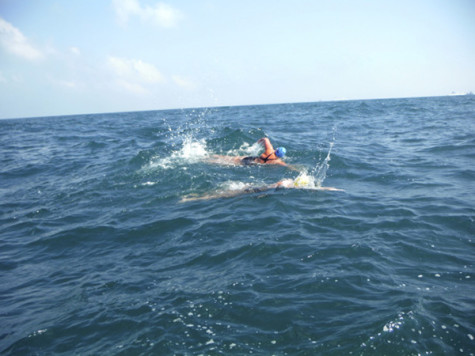 Former NYU swimmer, cancer survivor, conquers English Channel