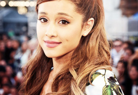 Christmas album comes with Grande promise