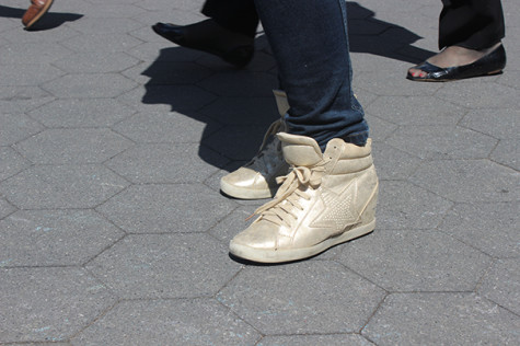 Students sport brand-name sneakers in latest fashion trend