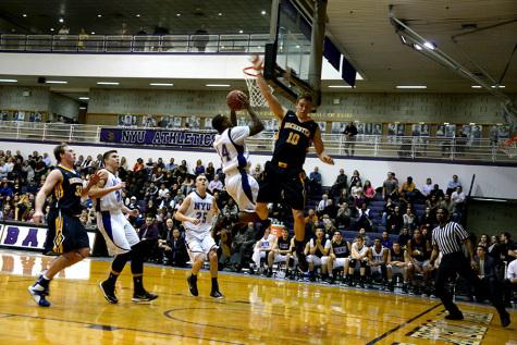 One win, one loss for basketball team during Friday games