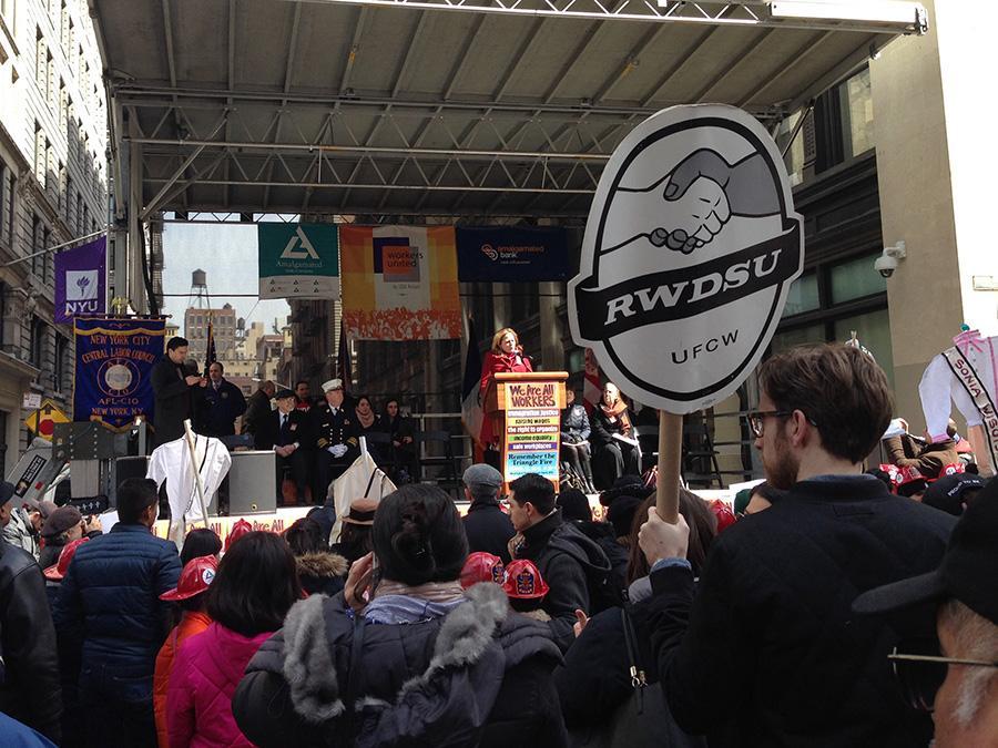 Groups of protesters rally at the 104th anniversary of the Triangle Shirtwaist Factory Fire, in which 146 people died.