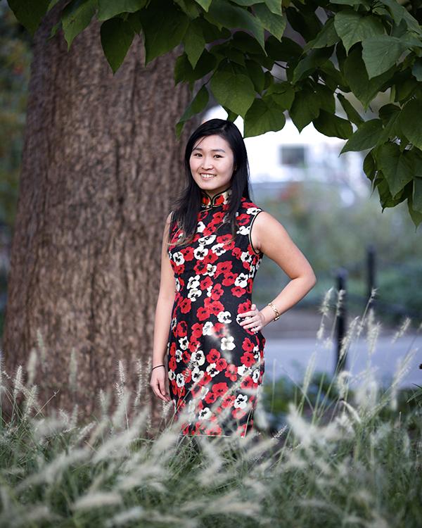 Emily Liu, a member of the Chinese Mei Society, is pictured wearing a traditional Chinese dress.