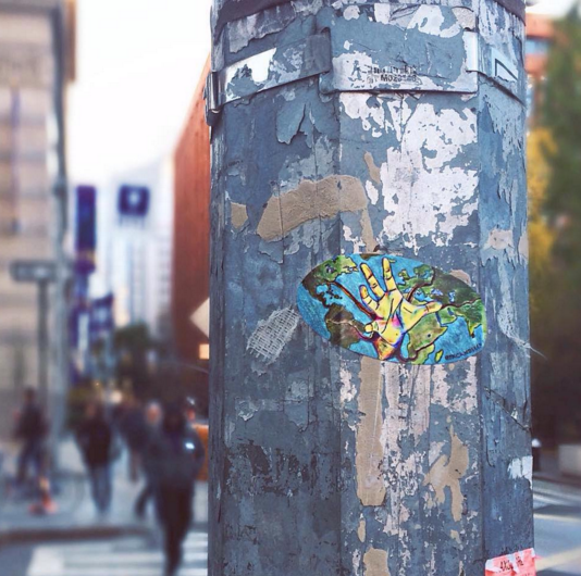 NYU Senior, Madison McCormick, is currently working on a sticker series titled “#crumblingborders” in a bid to raise awareness of the Syrian Refugee Crisis.