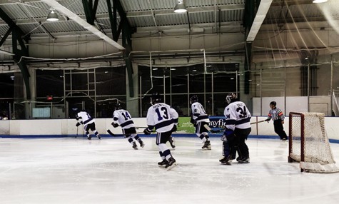 Hockey Begins National Title Defense With 8-2 Drubbing of Penn State