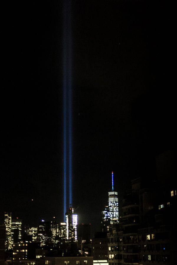 Two+bright+beams+shine+from+the+9%2F11+Memorial%E2%80%99s+reflecting+pools%2C+marking+the+sky+with+a+ghost+of+where+the+Twin+Towers+once+stood.+