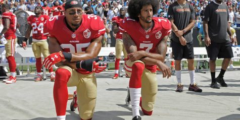Kaepernick Stands Up By Taking A Knee