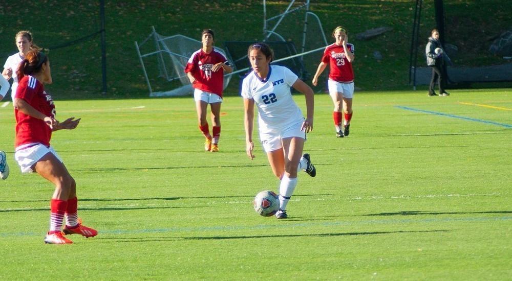 Sophomore Maddie Pena, determined, makes her way to score final goal off an assist.