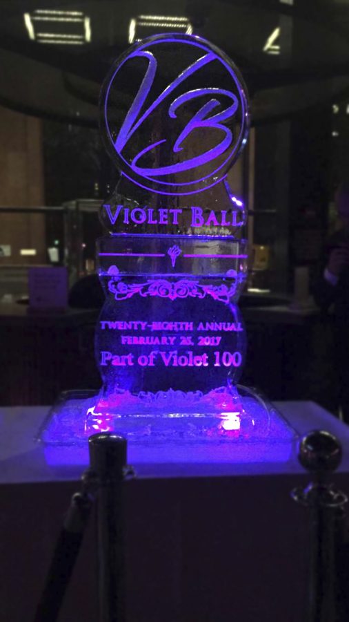 Students+gathered+around+the+ice+sculpture+in+the+atrium+of+Bobst+while+enjoying+the+annual+Violet+Ball.++The+event+took+place+on+Saturday%2C+February+26+as+part+of+Violet+100%27s+NYU+Spirit+Week.