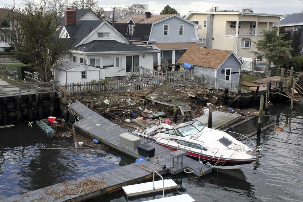The aftermath of Hurricane Sandy includes the destruction of property on Howard Beach. NYU’s Population Impact, Recovery and Resilience program is working on examining communities impacted by the disasters as well as the steps towards recovery.