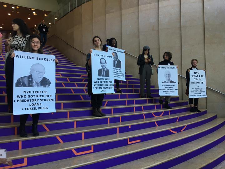 NYU+SLAM+members+made+posters+outlining+how+members+of+the+board+have+ties+to+other+industries+that+could+be+deemed+a+%22conflict+of+interest.%22