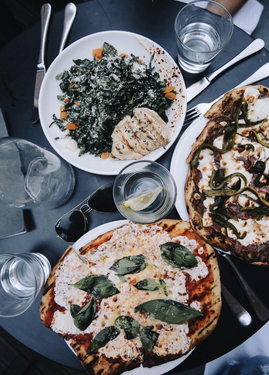 Flat lay photos of restaurant tables, aerial shots of plates and dishes, have become an Instagram staple to show off trendy foods.
