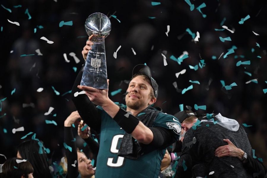 Philadelphia+Eagles+quarterback+Nick+Foles+holds+up+the+Superbowl+trophy+after+their+victory+over+the+New+England+Patriots+on+Feb.+4.