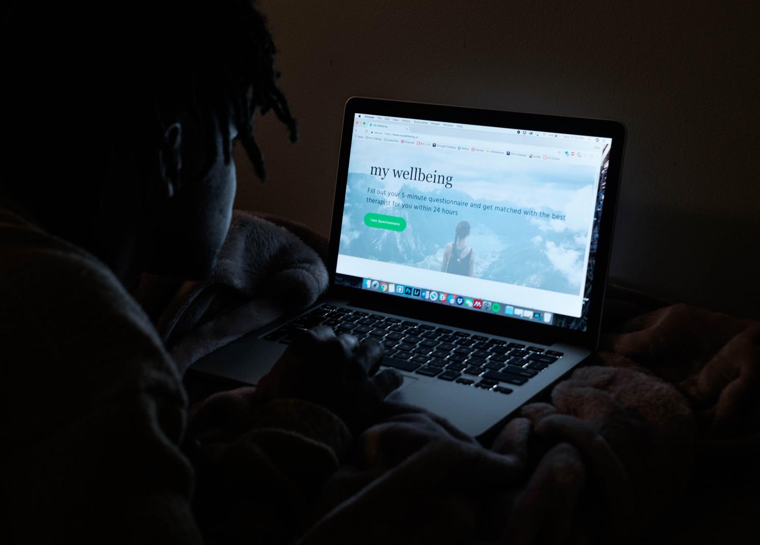 An NYU student looks at the My Wellbeing site, an online service that connects individuals with therapists in the New York City area.