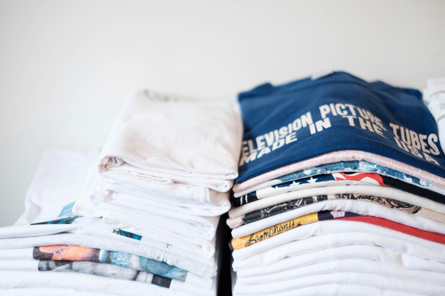 LS freshman Matias Mollin, also known as Matias the Broker on Grailed, has stacks of vintage T-shirts on his bed and ready to be shipped out to his customers.