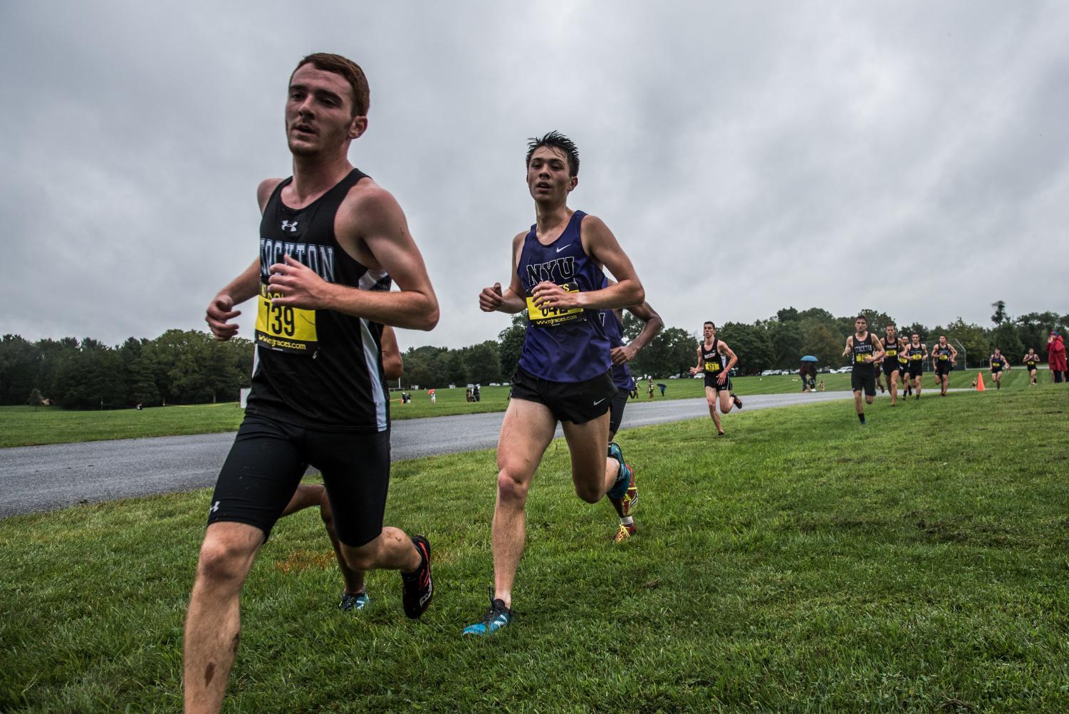 Steinhardt junior Yuji Cusick (center) runs a cross-country race at the Ramapo College Season Opener on Friday, Aug. 31.